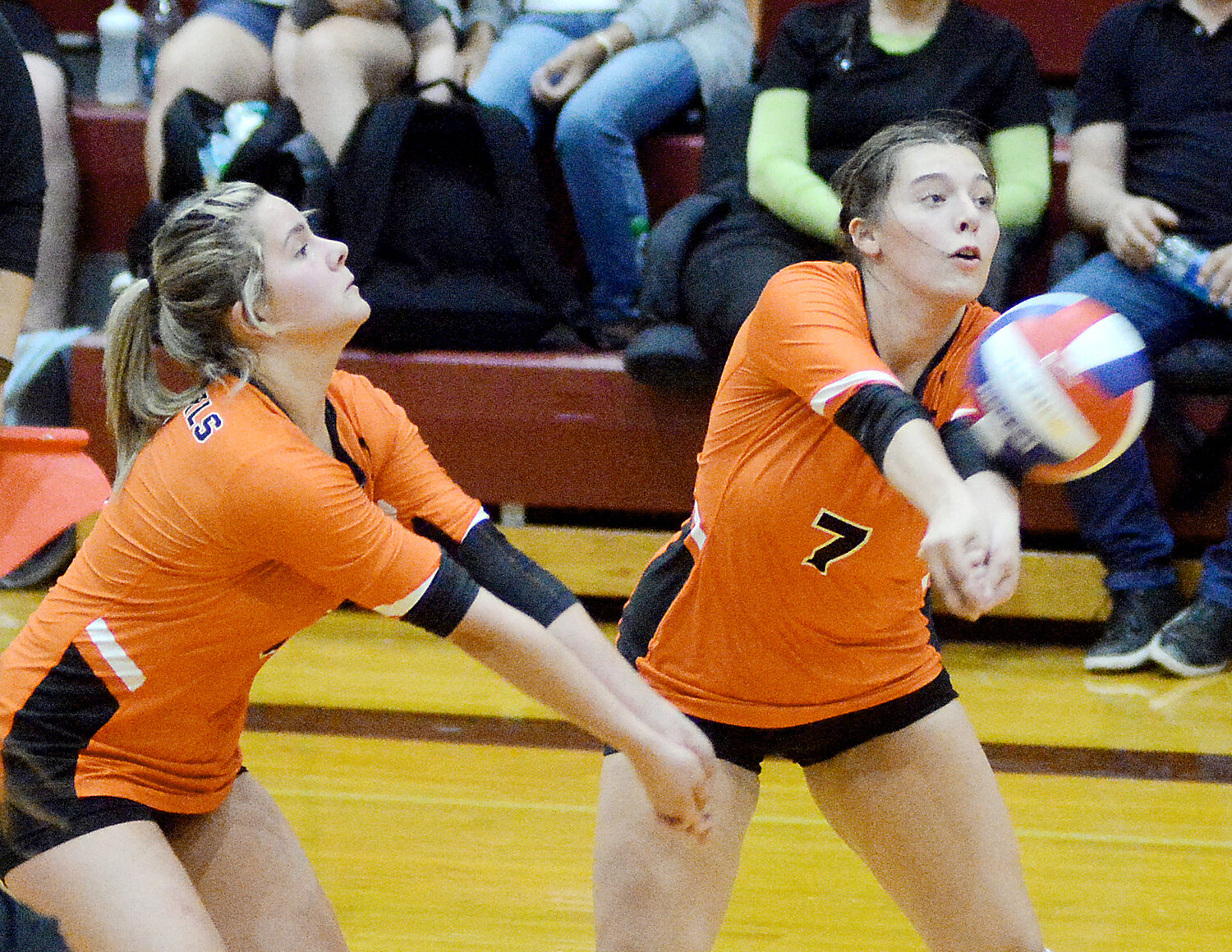Makensy Pigg (right) passes the volleyball while McKenzy Echols (above, left) was in position to do the same during Owensville’s five-set victory Thursday night in Osage County after Owensville won the C-team match in two sets and the junior varsity match in three sets.